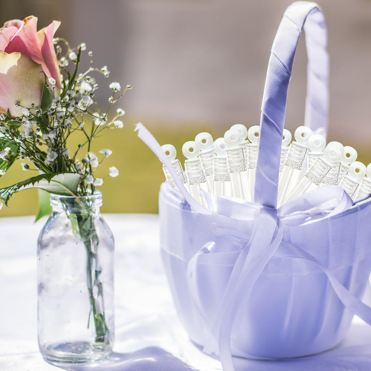 Wondrus bubble wands on wedding table as playful decor.