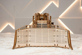 Wood Trick Terrain Titan bulldozer blade in motion for dynamic display