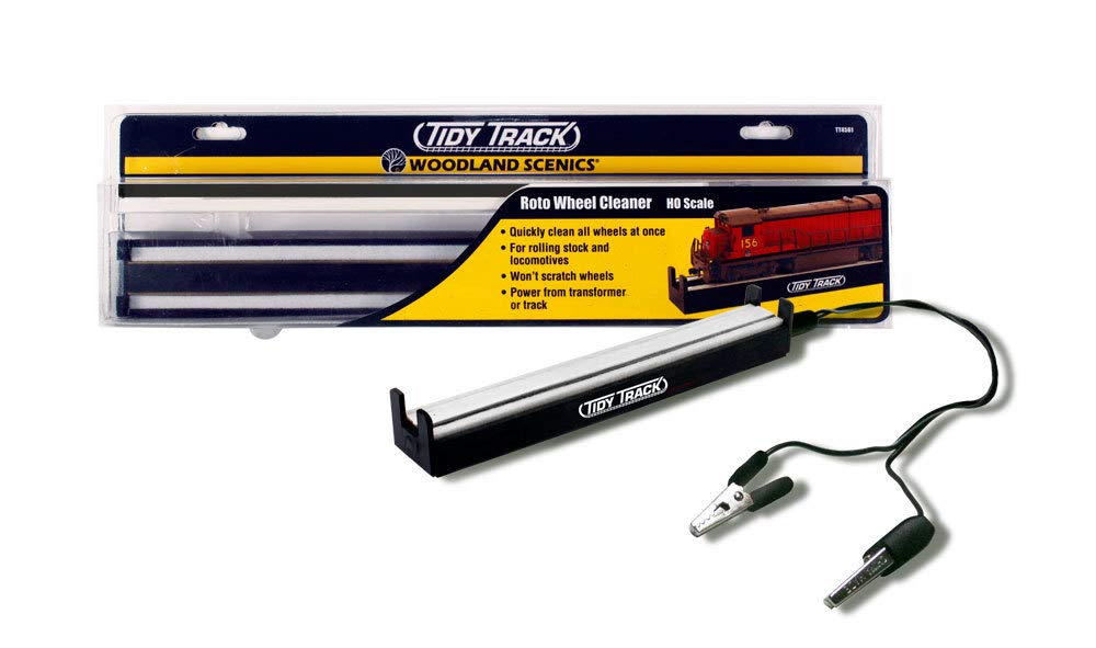 Woodland Scenics Tidy Track Roto Wheel Cleaner on a workbench for fast wheel cleaning.