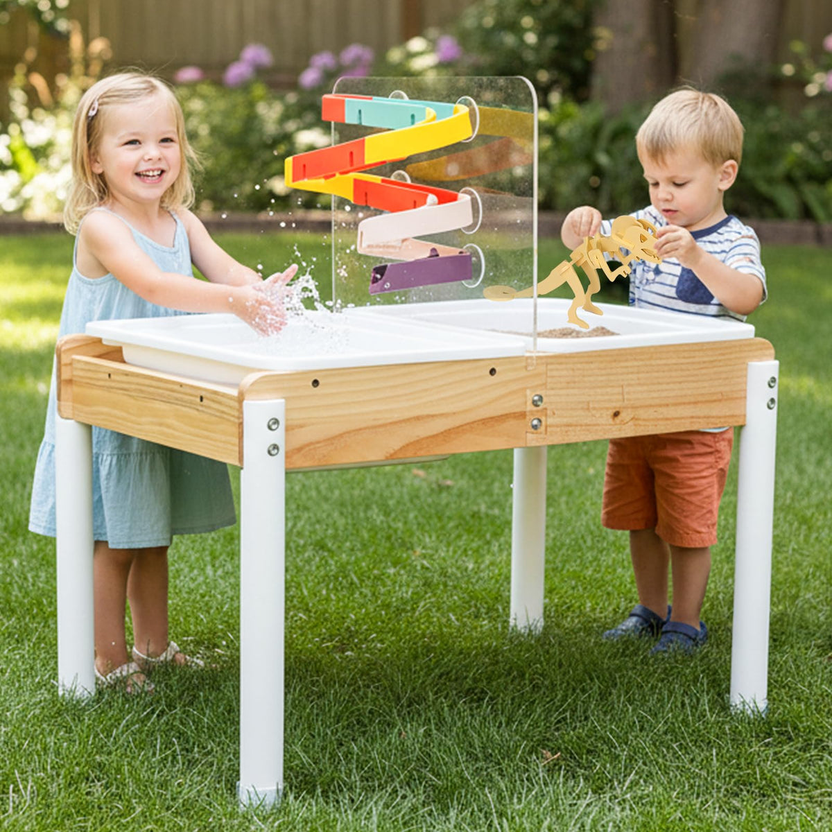 Woodtoe sand and water table setup with dinosaur puzzle for outdoor sensory play