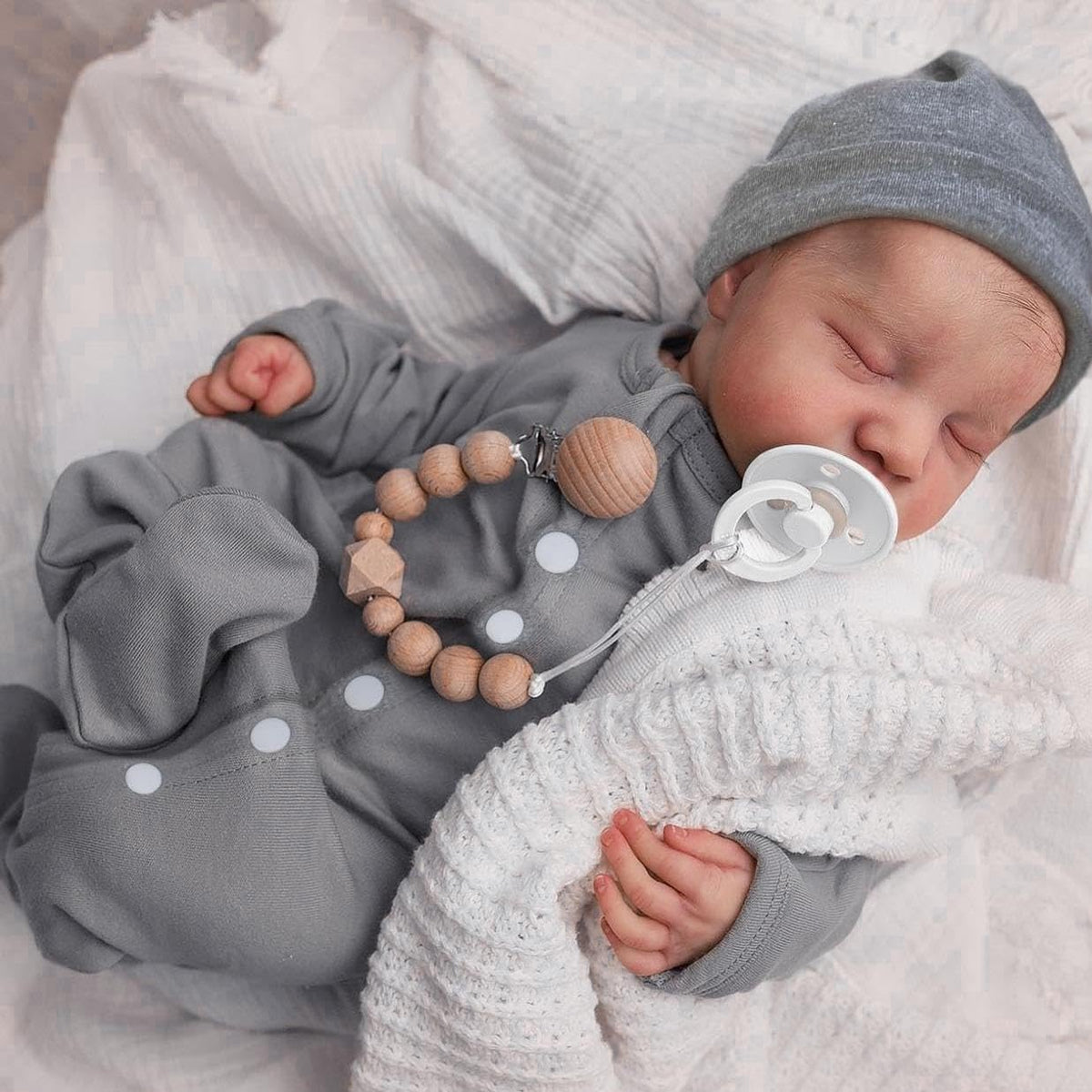 WOOROY 18in reborn baby with full vinyl body for natural, poseable play.