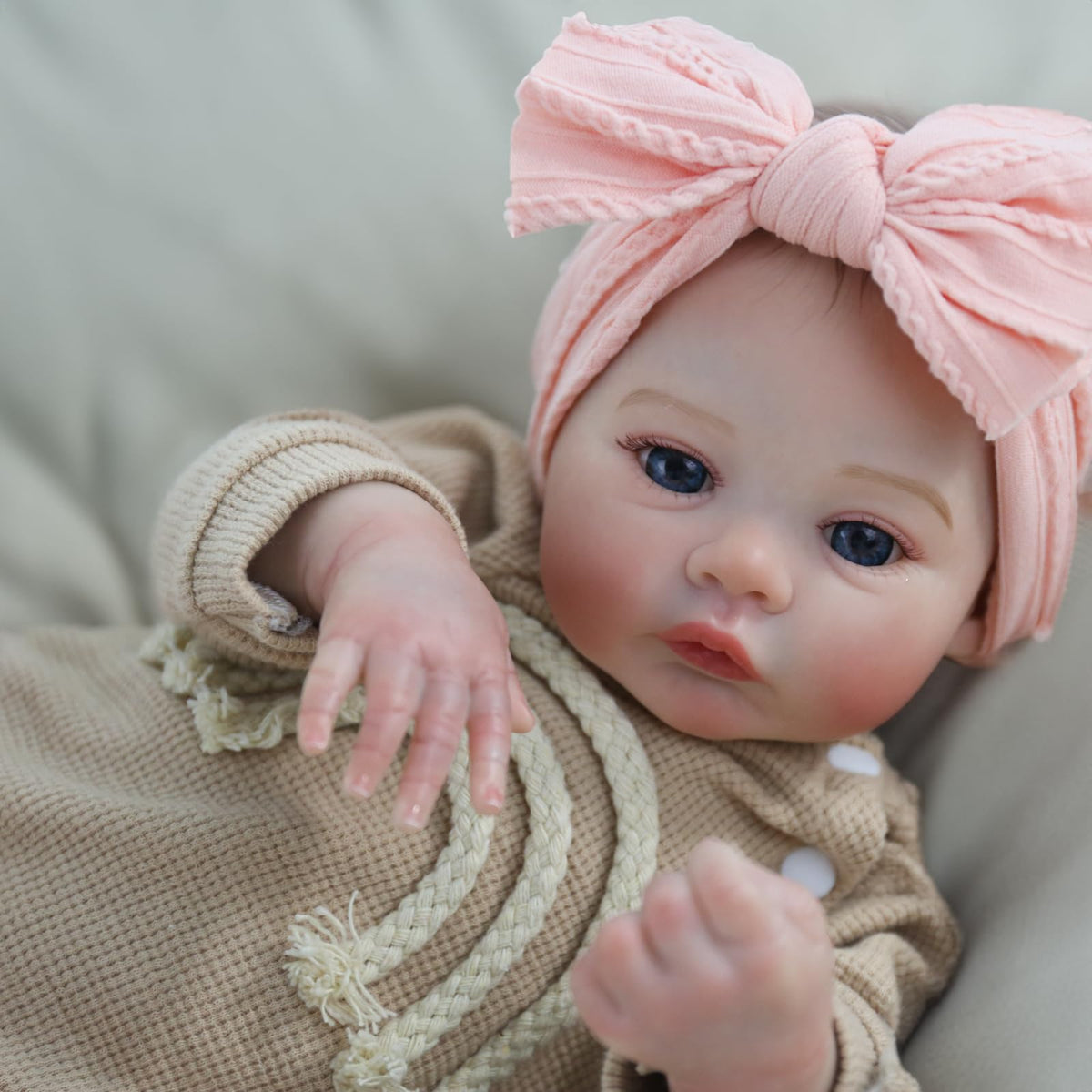WOOROY reborn doll face detail shows lifelike paint and veins for authentic look.