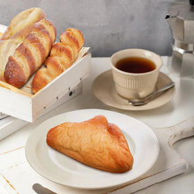 Durable PU bread replicas resist spoilage for long-term presentation.