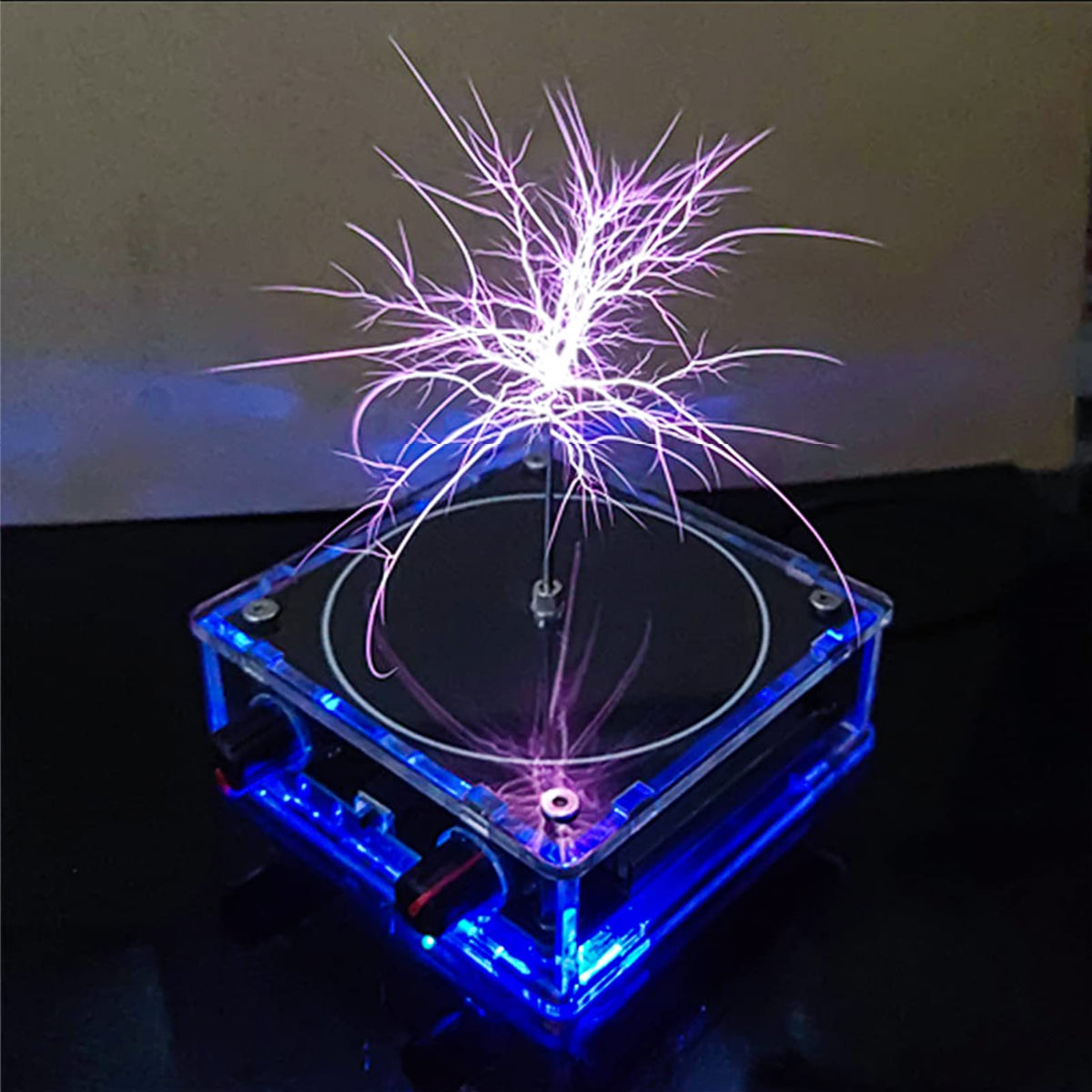 WOWNOVA music solid-state Tesla coil arc lights the desk in a dramatic science demo