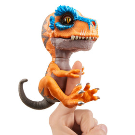 WowWee Scratch Orange Untamed T-Rex roaring mode captures action and sound