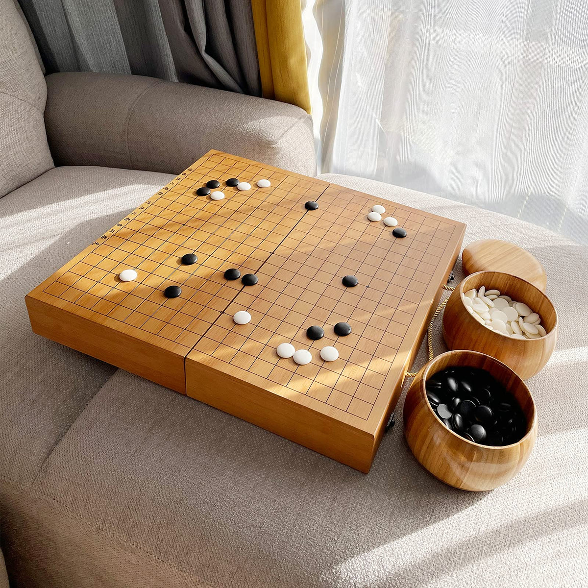 Wowwoody bamboo bowls securely cradle stones between moves.