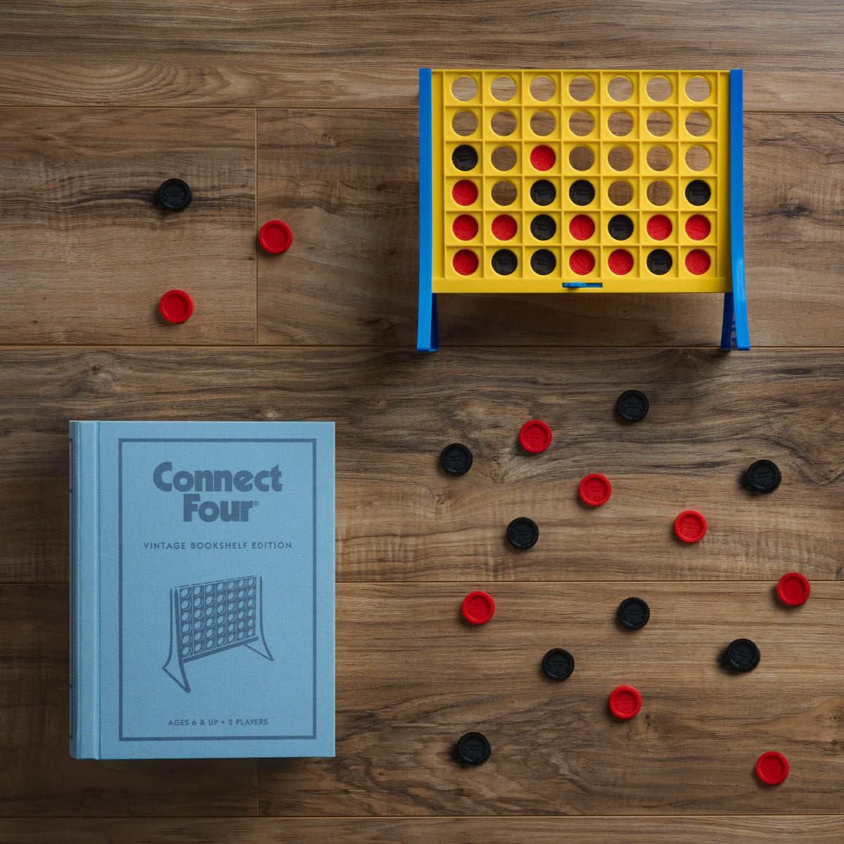 WS Game Company Connect Four Vintage Bookshelf fabric wrap, a tactile, retro-inspired cover.