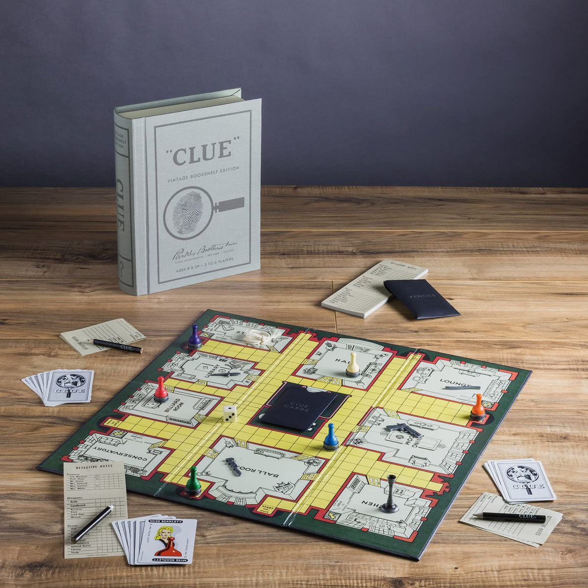 WS Game Company Clue Vintage Bookshelf Edition linen-wrapped case adds decor and storage