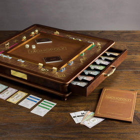 WS Game Company Monopoly Luxury Edition die-cast houses and hotels with tactile heft.