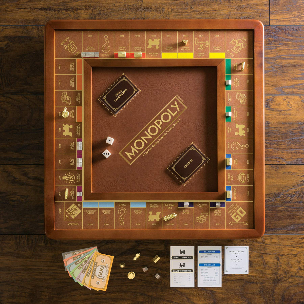 WS Game Company Monopoly Luxury Edition gold foil-stamped board, premium visual appeal.