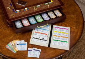 WS Game Company Monopoly Luxury Edition storage drawers with die-cast pulls for organization.