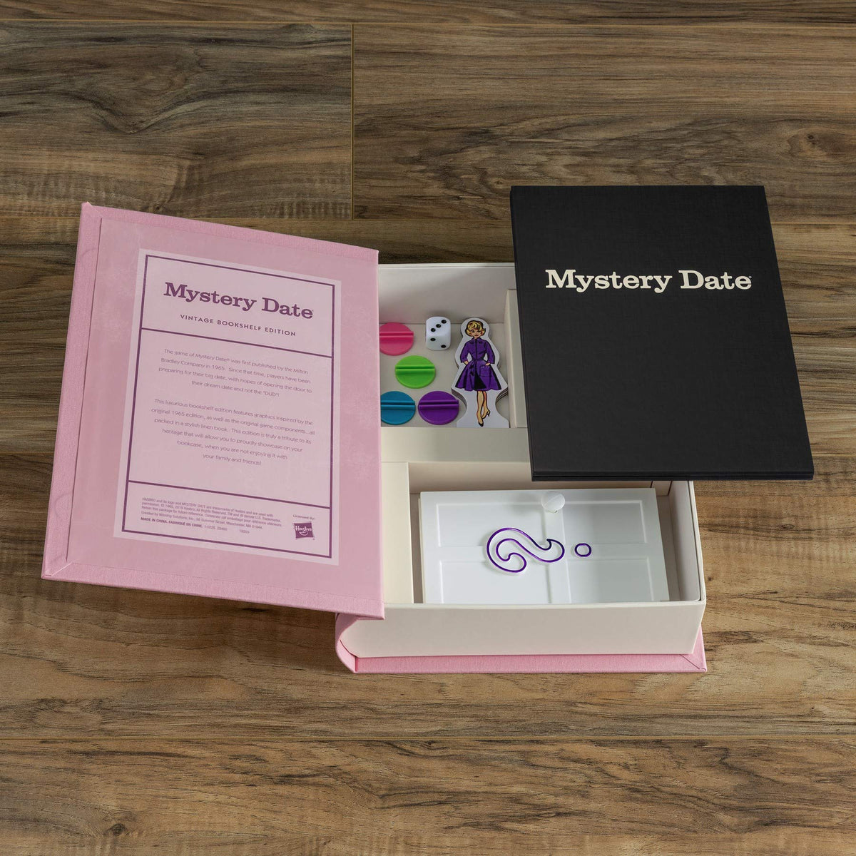 WS Game Company Mystery Date includes pawns and a die for players.