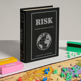 WS Game Company Risk Vintage Bookshelf Edition compact case saves shelf space and travels easily