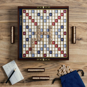 WS Game Company Scrabble Deluxe Travel Edition raised grid board keeps tiles secure during play