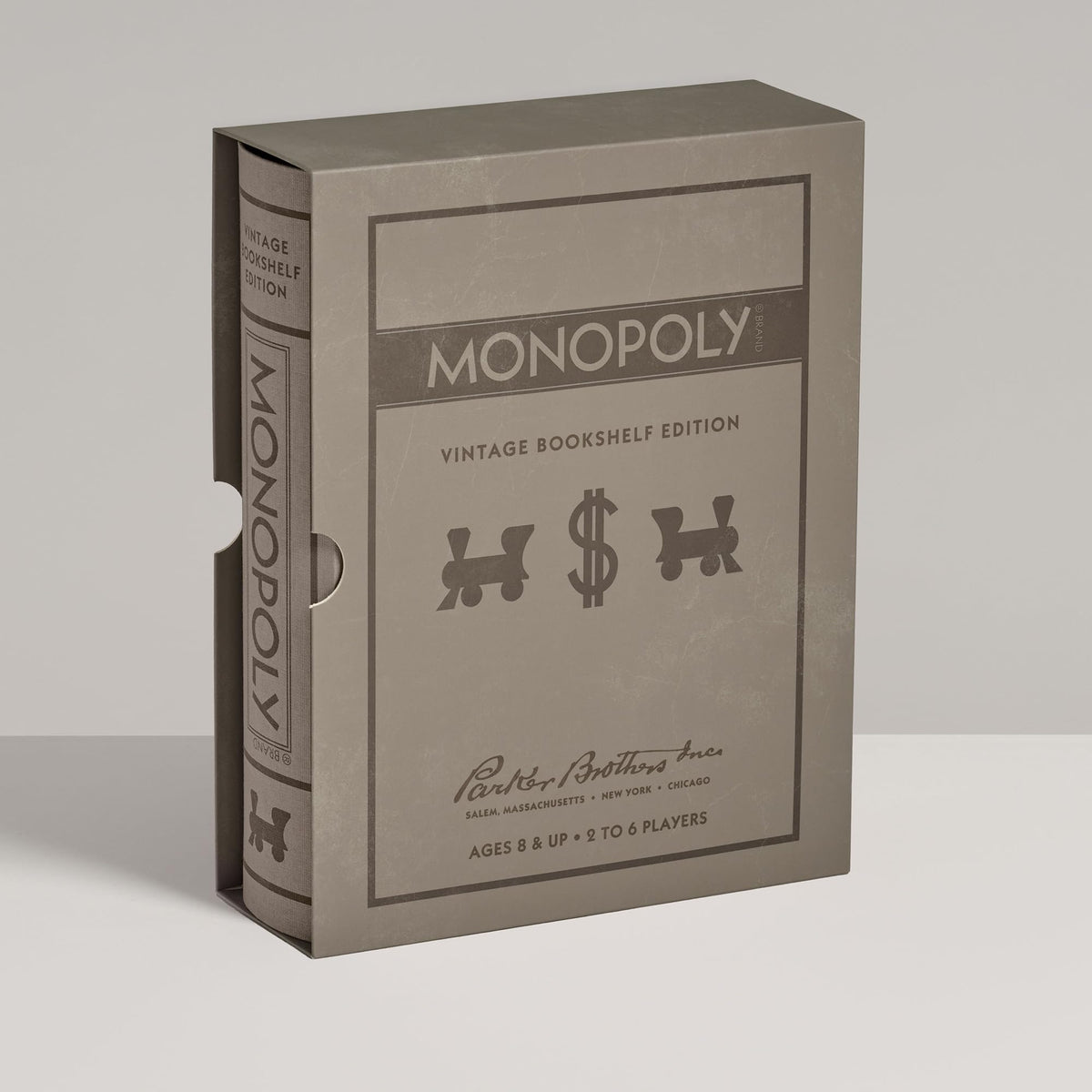 Wooden houses and hotels from WS Game Company Monopoly set for tactile gameplay
