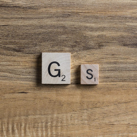 Deluxe scorepad included for tracking Scrabble Giant Deluxe scores