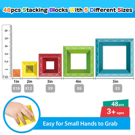 Children's hands grasp blocks for hands-on construction with WSKC.