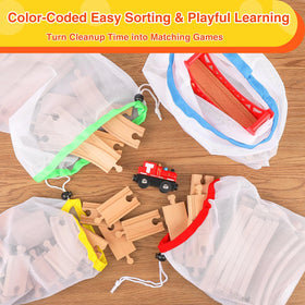 WudBudz included toy-train demonstrating immediate, imaginative play on the tracks.