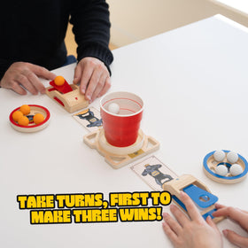 Wudly Games King Pong wooden shooters in action during play.
