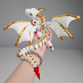 WUQIREN dragon wings detail showing articulated joints for desk posing