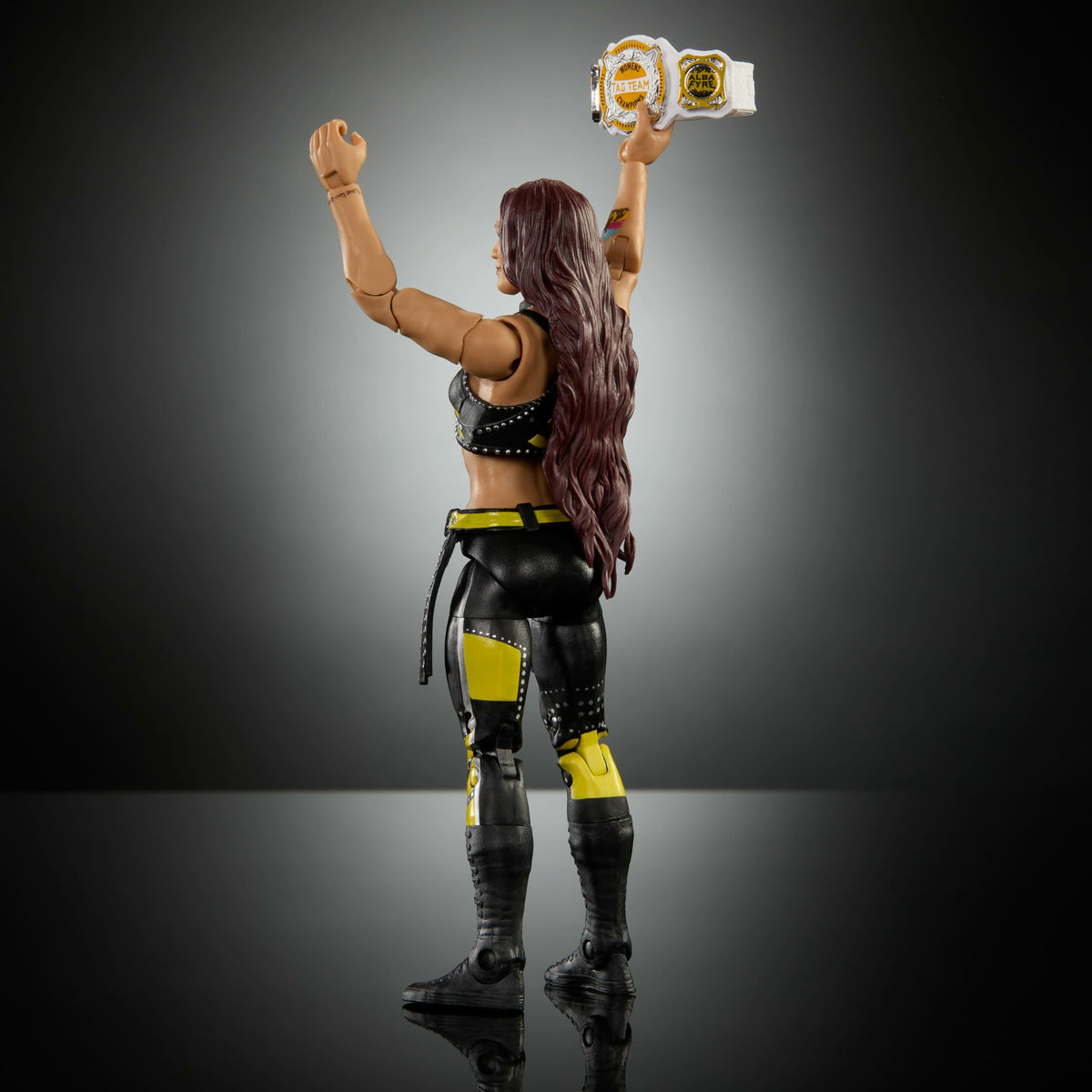 WWE Alba Fyre figure demonstrates dynamic poses for shelf display.
