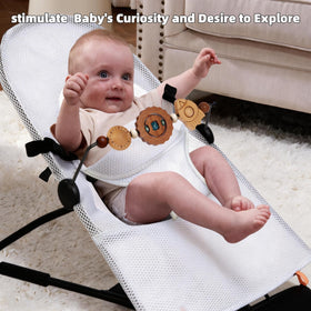 WYFWFDF baby bouncer toy bar spaceship supports visual tracking and fine motor play.