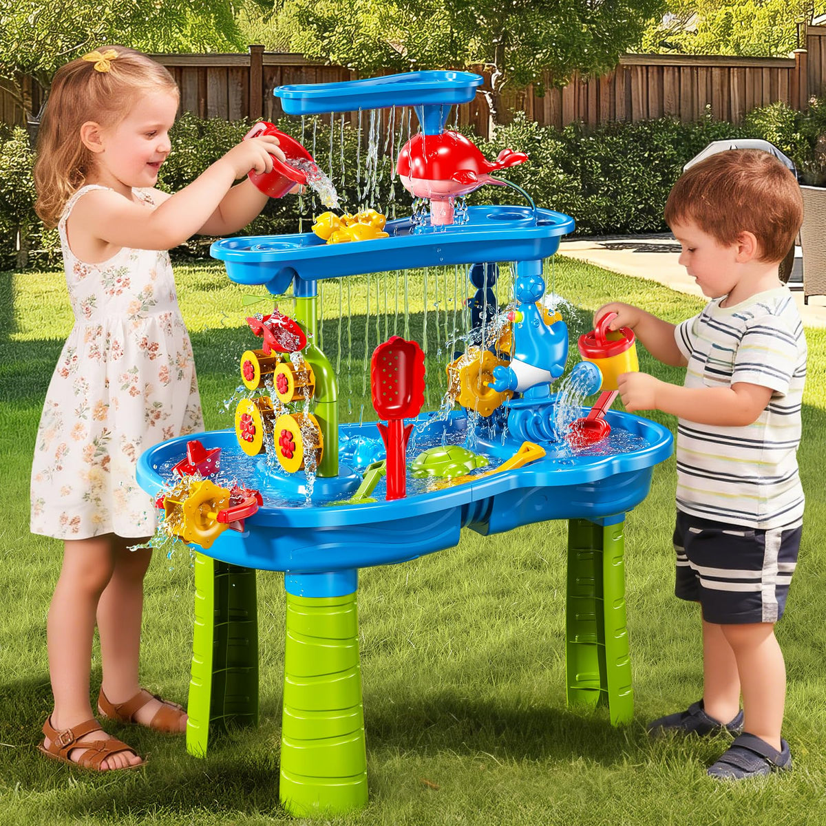Xelabrion bird sprinkler on sand water table creating waterfall play