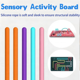 Xesakesi silicone board with 14 strings closeup, promotes dexterity and hand-eye coordination.