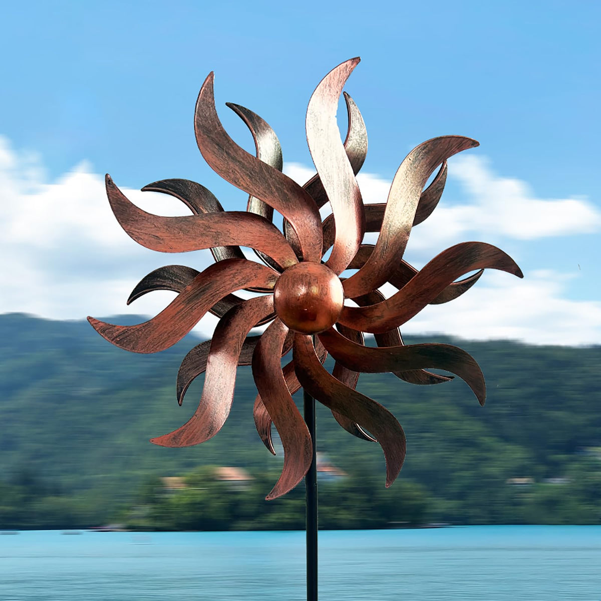 XLSWAIN Willow Leaf 360° Spinner outdoors adds graceful garden motion.
