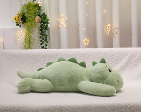 XMV dinosaur weighted plush eye detail emphasizes adorable design and friendly look.