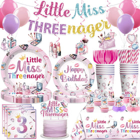 Xynic Threenager banner and cake decorations add festive flair for a 3rd birthday.