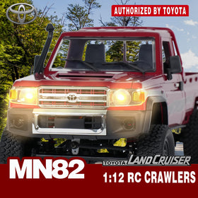 YAZHIYI MN-82 RC rock crawler top view showing dual 1200mAh batteries