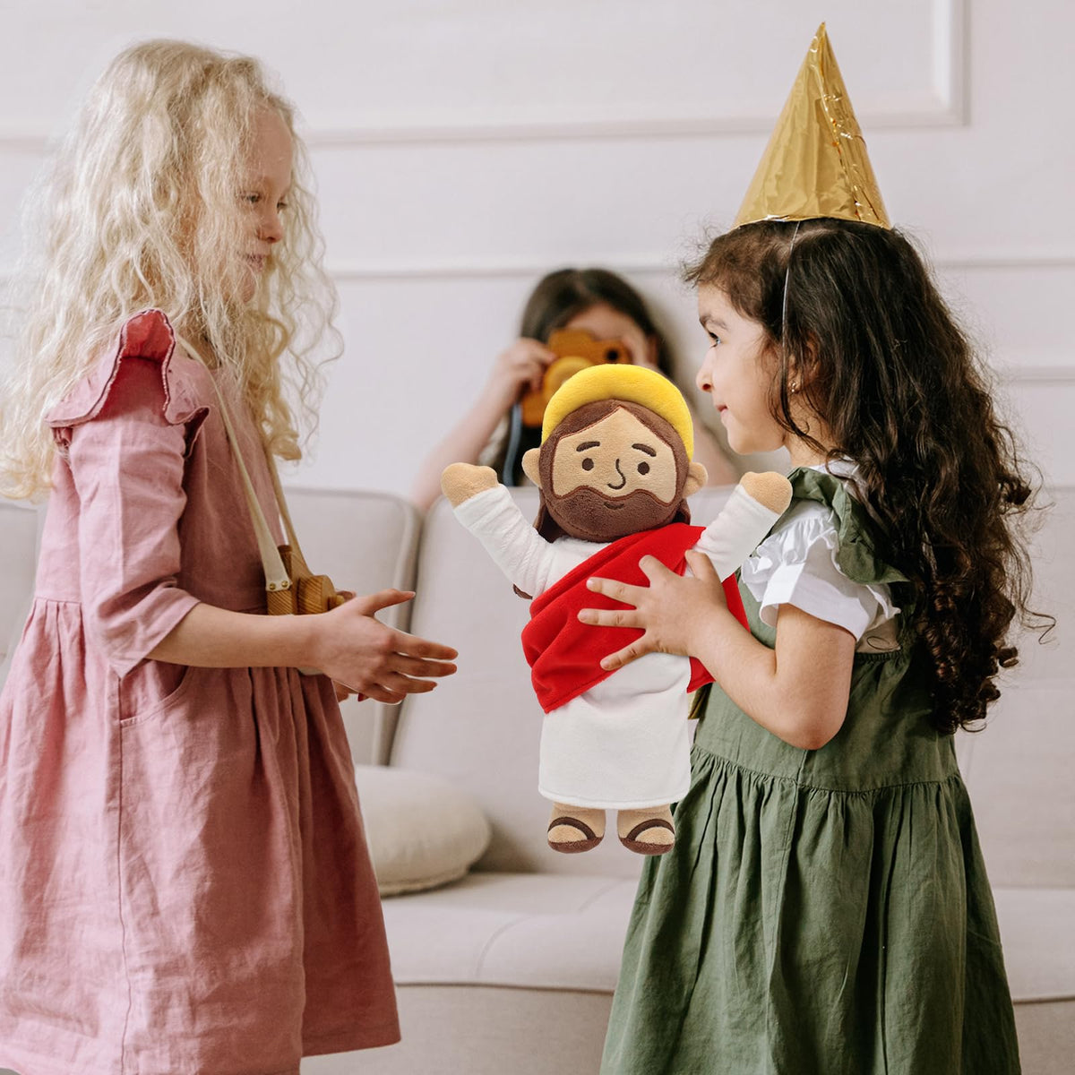 Yelakey Jesus plush with brown sandals reflects traditional attire.