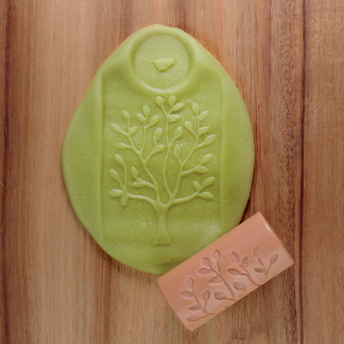 Yellow Door forest friends roller: snail and leaves enhances sensory play and fine motor control.