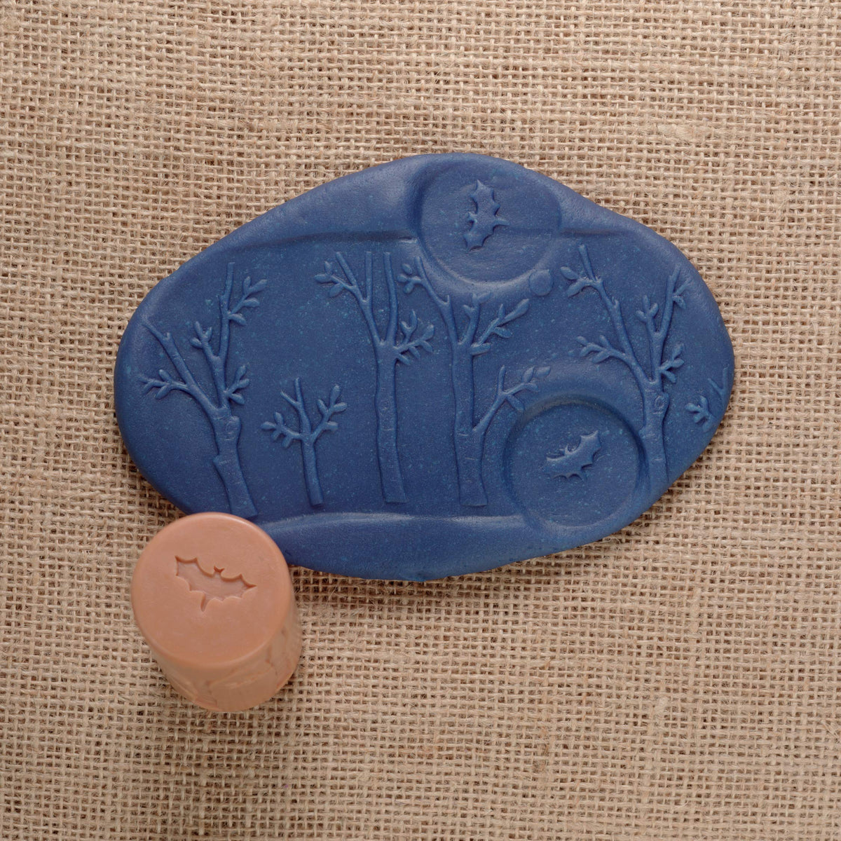Yellow Door forest friends roller: squirrel and tree trunk supports counting and winding tales.