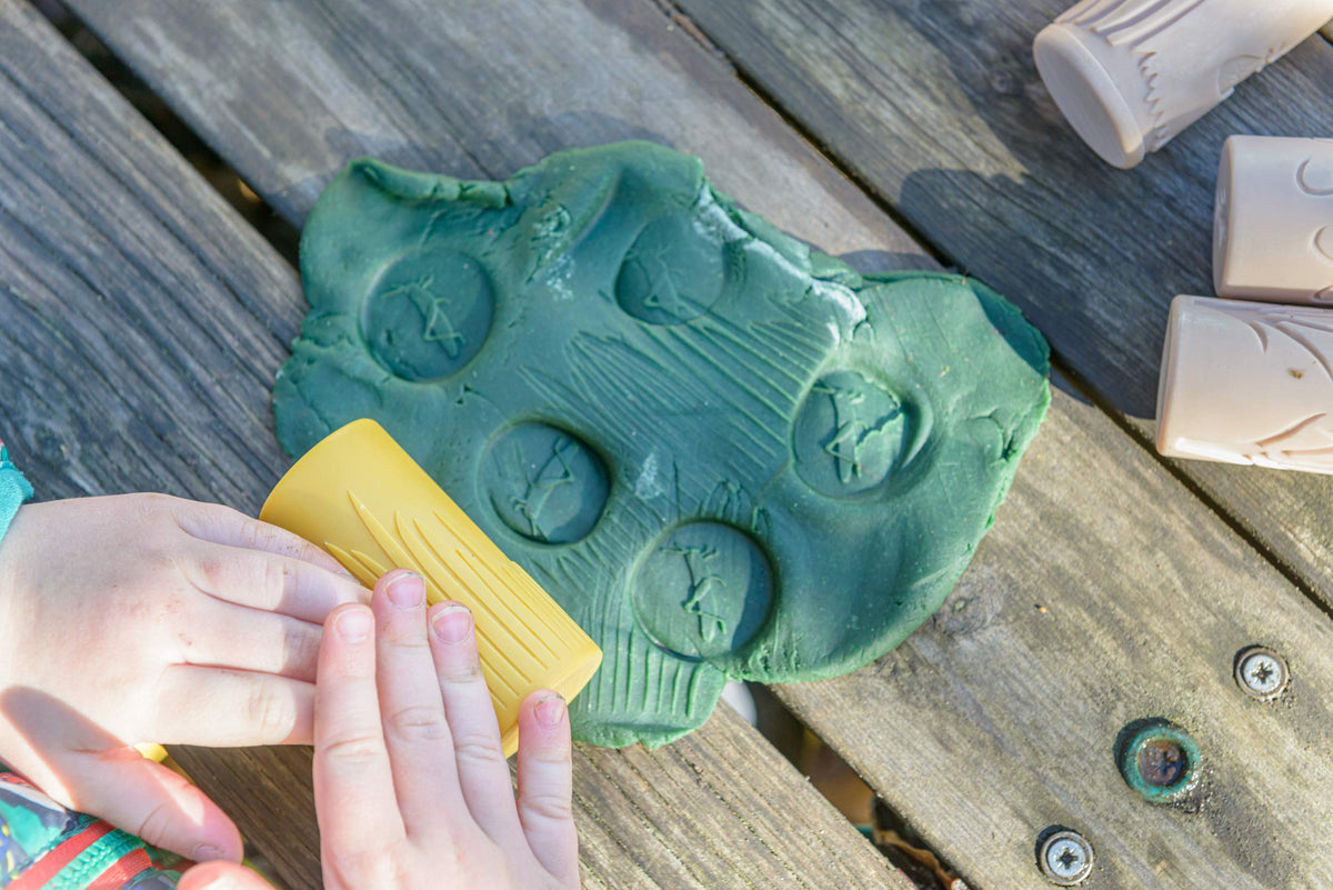 Yellow Door Let's Roll grasshopper and grass roller for outdoor-themed crafting.