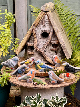 Yellow Door Blue Tit stone offers realistic textures for outdoor sensory play.