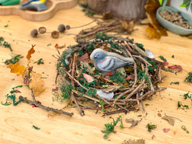 Yellow Door Goldfinch stone aids focus and fine-motor engagement outdoors.