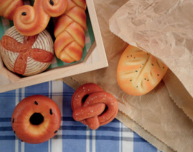 Yellow Door sensory play stones croissant – kid-friendly stones for imaginative kitchen scenes