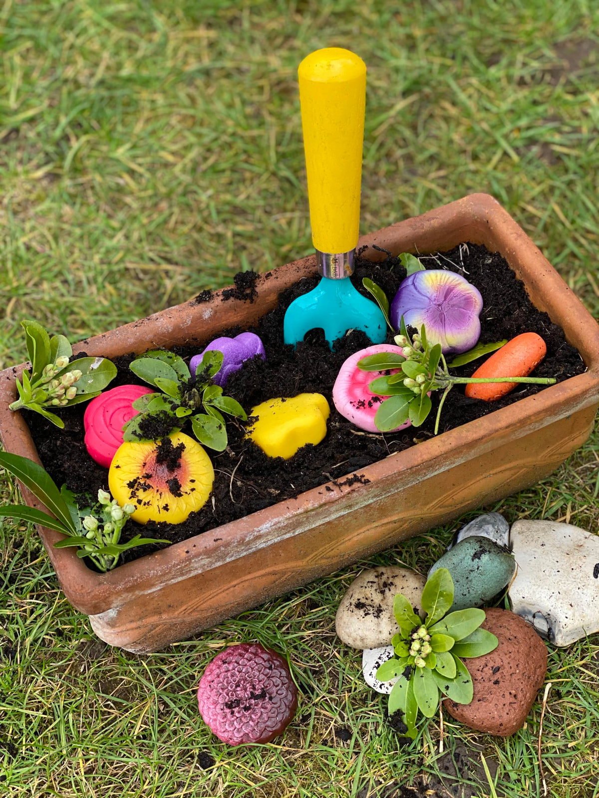 Yellow Door tulip stone for color-rich sensory play and nature exploration.