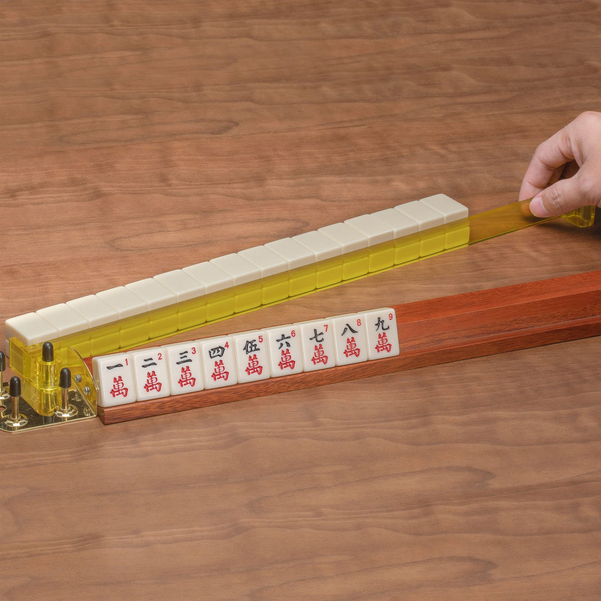 Yellow Mountain Imports pusher-attachment demo shows rack integration and swinging action
