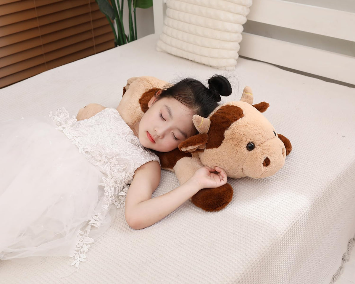 YESGIRL cow weighted plush bedroom decor shot demonstrates versatile placement on bed.