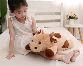 YESGIRL cow weighted plush face details capture cute design and inviting smile.