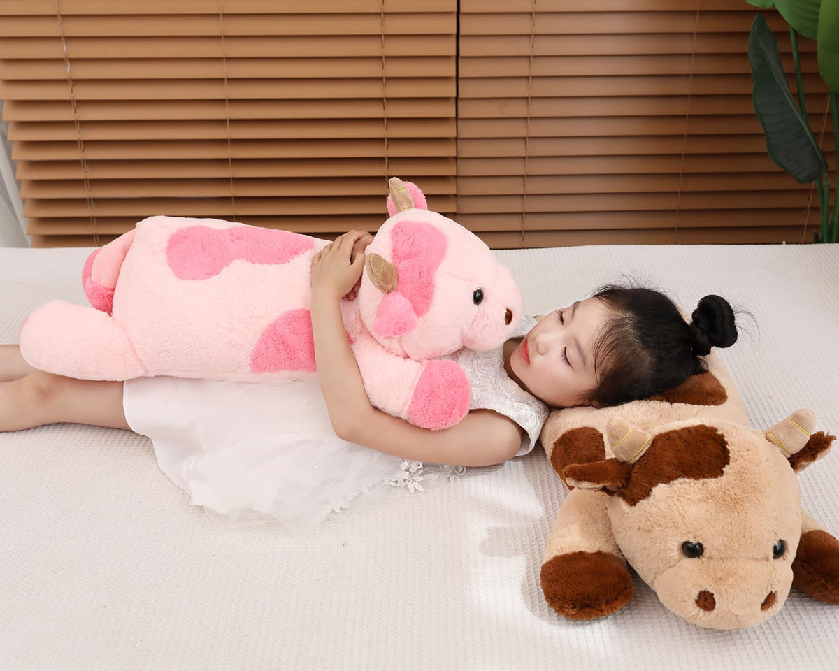 YesGIRL cow weighted plush on a desk or sofa, ideal for office or study space.