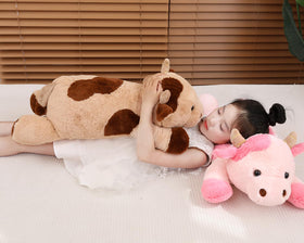 YESGIRL cow weighted plush care shot highlights vacuum-seal packaging and quick recovery.