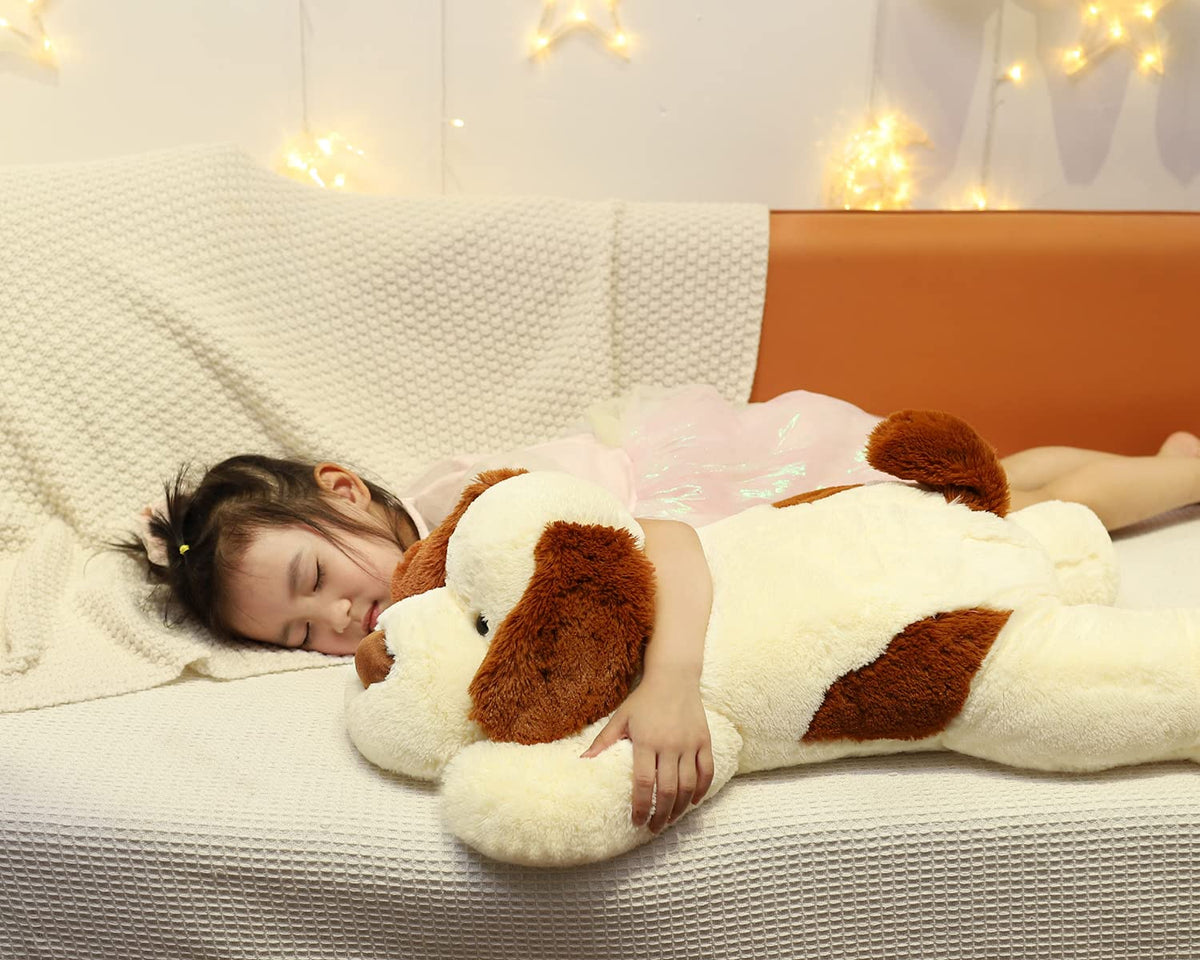 YesGIRL weighted dog plush as a cuddling pillow for reading or winding down.