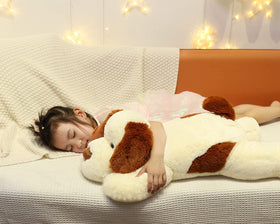 YesGIRL weighted dog plush as a cuddling pillow for reading or winding down.