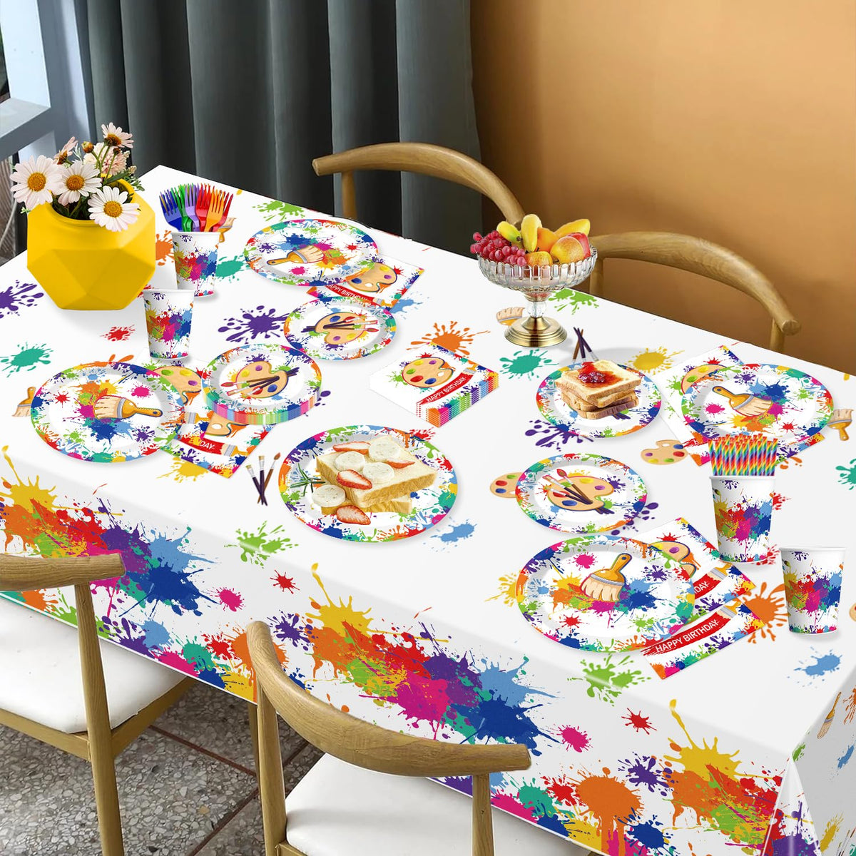 Yingoto paint party balloons frame the space with bright color.