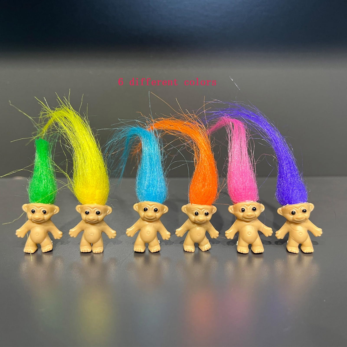 Yintlilocn Troll doll features a 0.78-inch body and 2-inch hair for tiny displays.