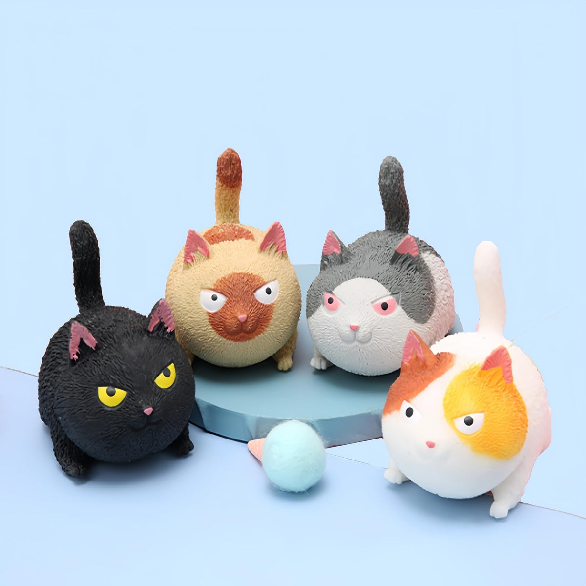 YJHWLF four-pack finger toy cat-squeeze balls for stress relief.